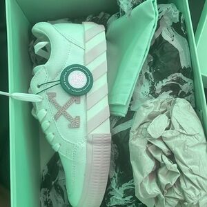 Pink and white off-white shoes. NEVER been worn. Size 5.